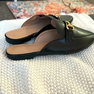 Black faux leather mules